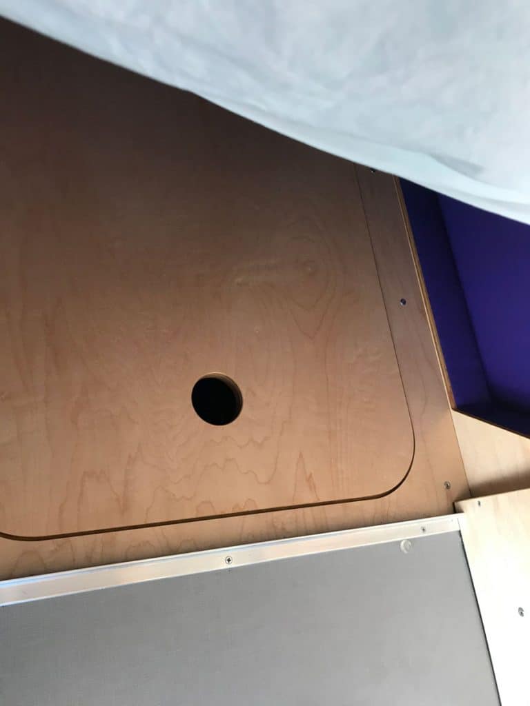 electrical cabinet door under the bed