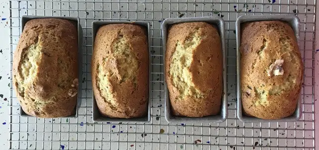 4 loaves of date bread cooling