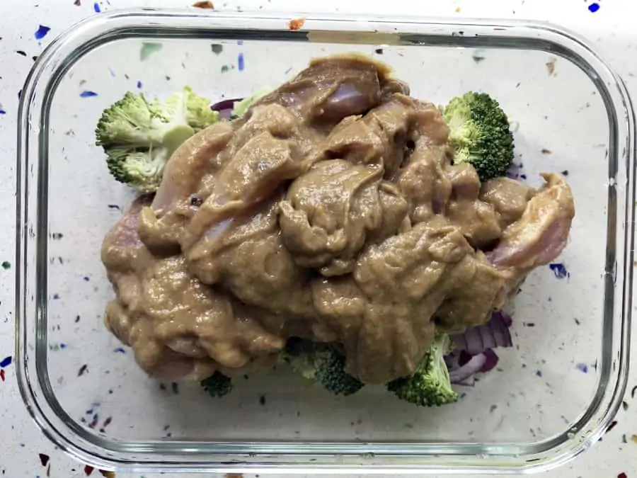 Thai green curry peanut sauce and chicken on top of vegetables