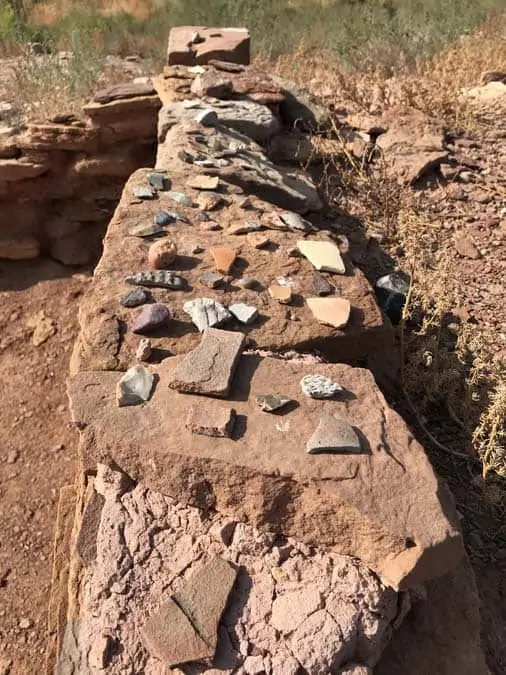 Pottery fragments on wall of Homolovi Hopi ruins.