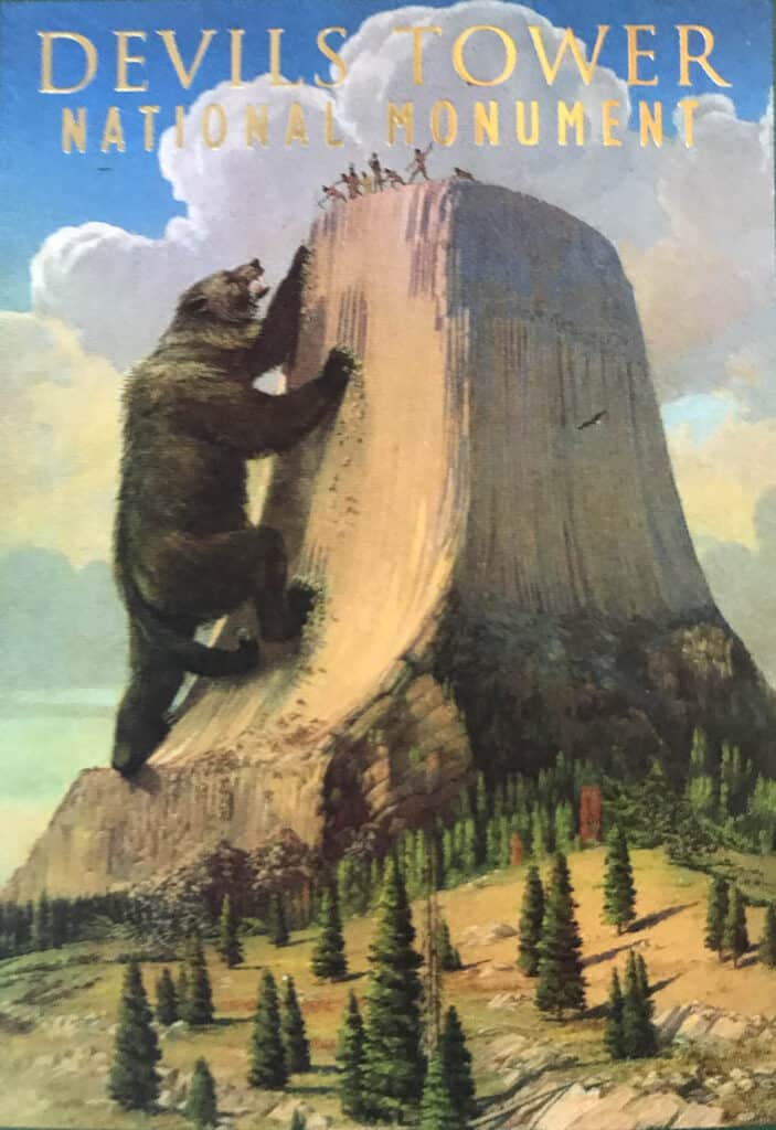 Postcard depicting the creation of Devil's Tower. Bear scratching mountain.