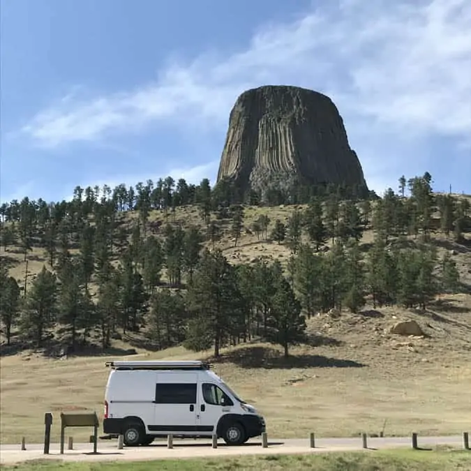 Promaster campervan with Devil's Tower in background